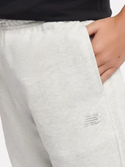 Gris - Joggings New Balance French terry coupe droite à petit logo