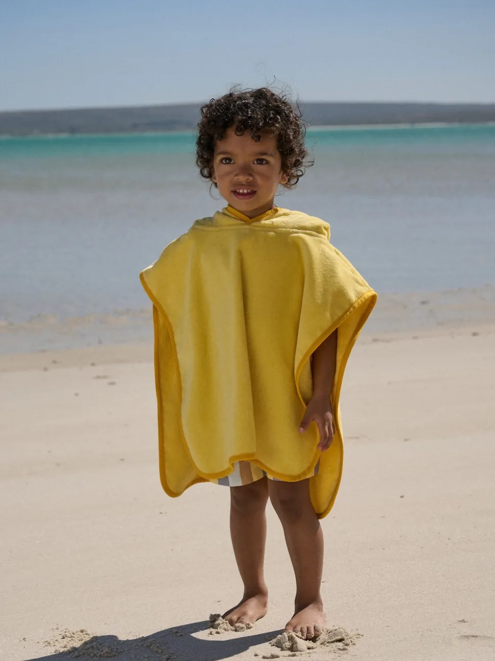 Jaune lion - Poncho en tissu éponge (9mths-6yrs)