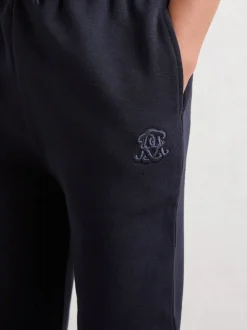 Pantalon de jogging Reiss Mellor en coton brodé à monogramme