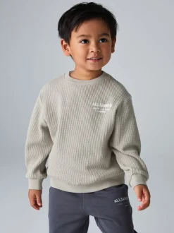 Sweat-shirt smALLSAINTS Underground oversize gaufré à col rond pour garçons